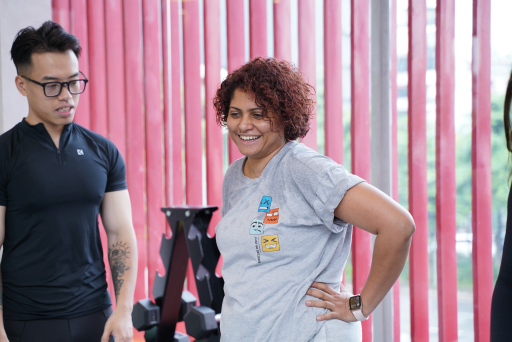Friendly gym environment with trainers and clients